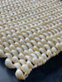 creamy white cowrie shell placement